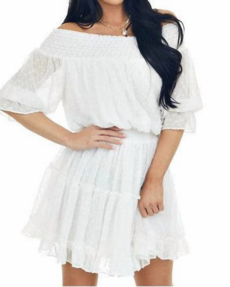 Back of a model wearing a size L Swiss Dot Dress in Ivory in Ivory by BluIvy. | dia_product_style_image_id:340452